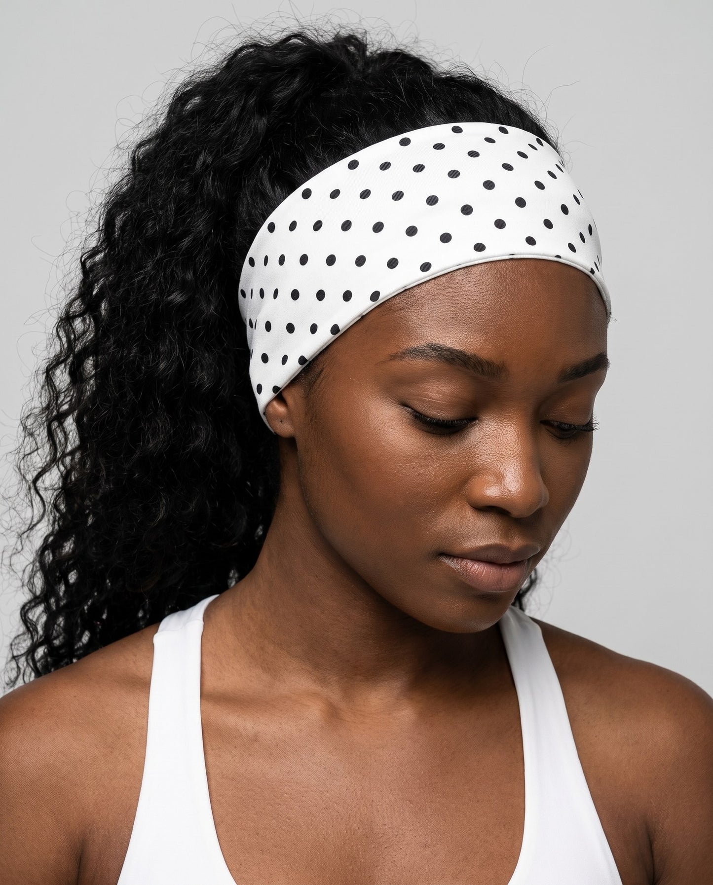 Fascia per capelli a pois bianca con pois neri