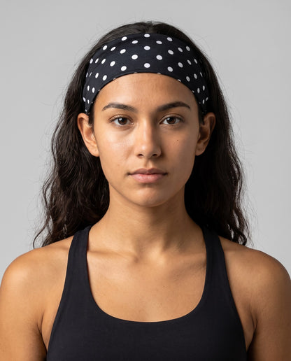 Fascia per capelli a pois nera con pois bianchi, vista frontale
