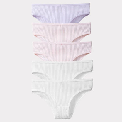 5 × Slip Pureline in omaggio · inclusi nei 10 del pack · Toni chiari