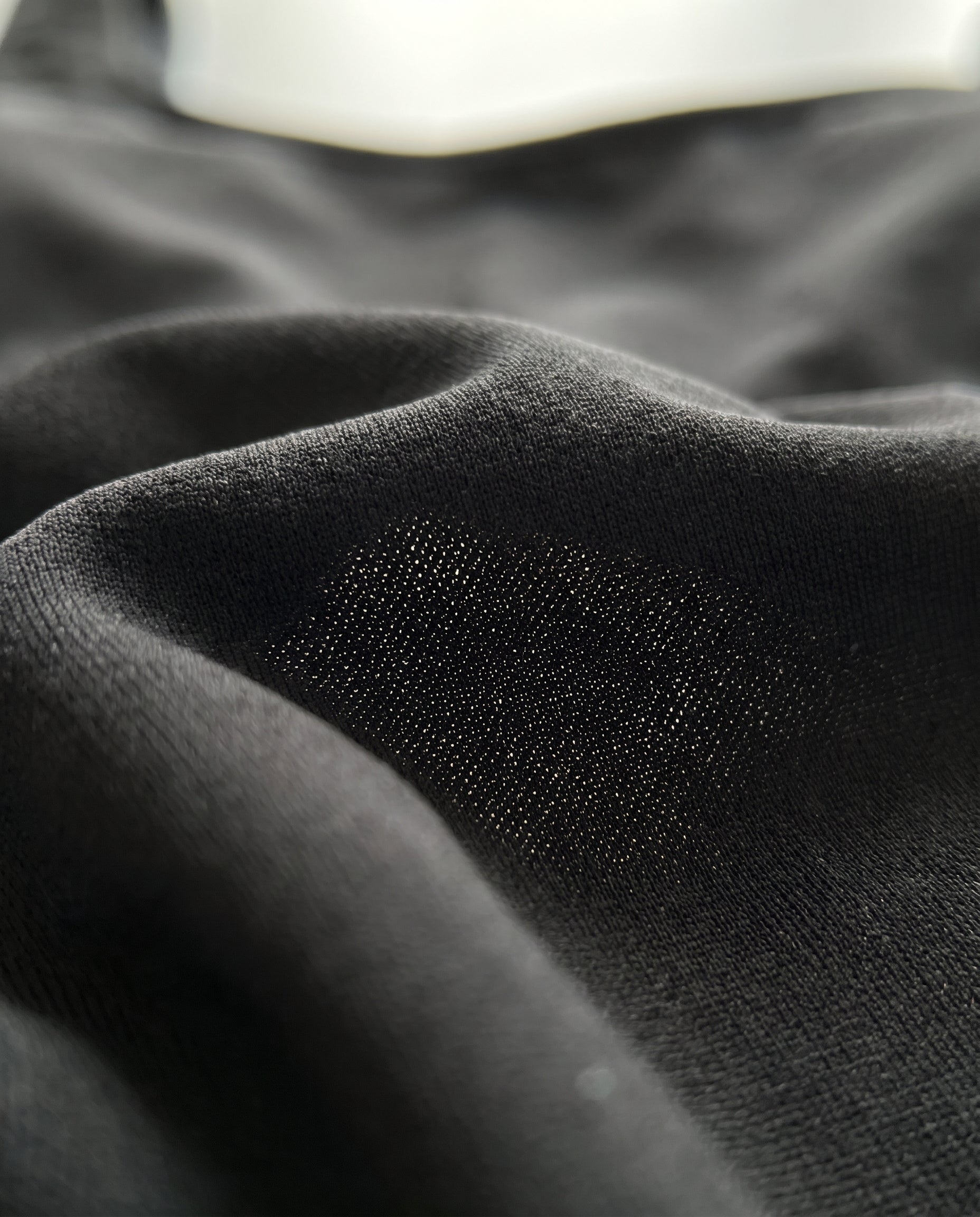 Solaro — macro tessuto tan-through · Rolvea